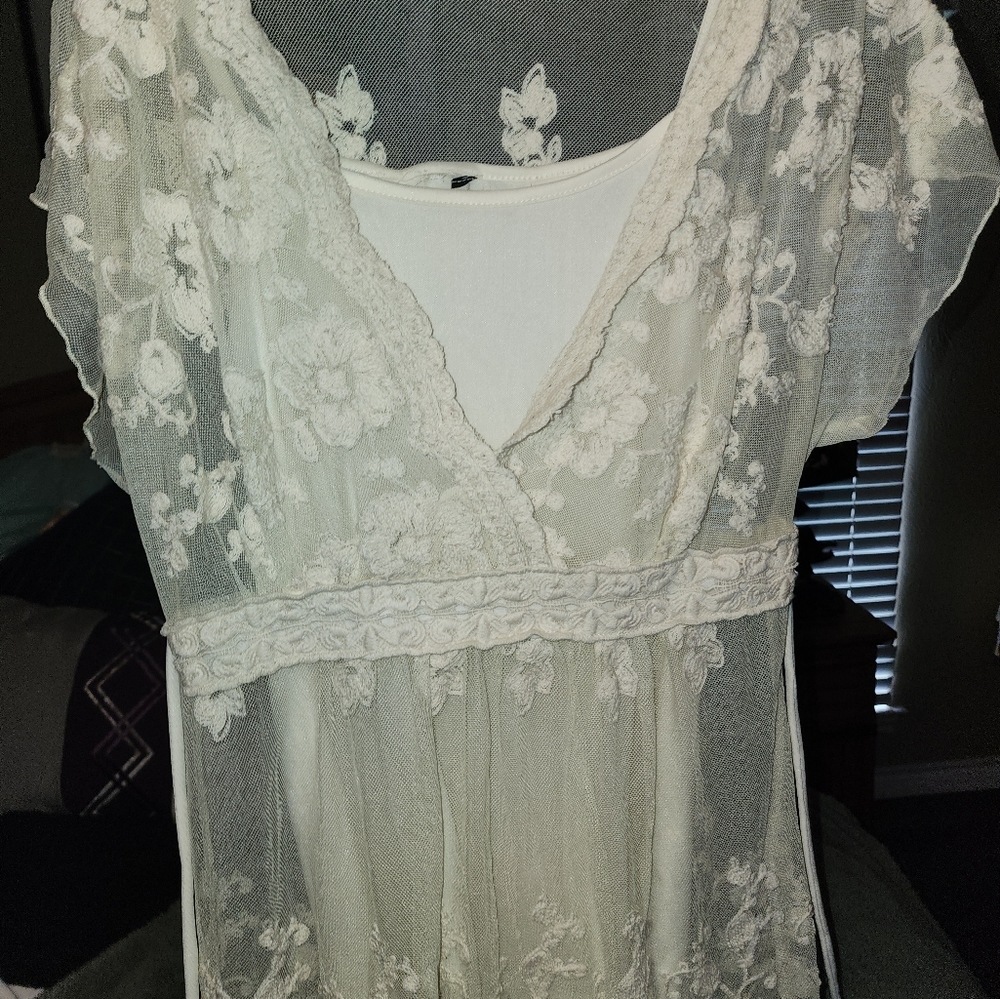 Sultry off white lace top with attached cami